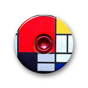 Composition with Red, Yellow, Blue and Black Bicycle Headset Cap